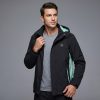JHJ02 Heated Jacket - Worn View (Men's) Man wearing JHJ02 black heated jacket open over a grey shirt, standing view
